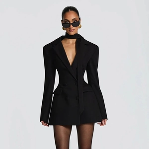 Detailed view of black slim-fit blazer dress with double-breasted design and necktie