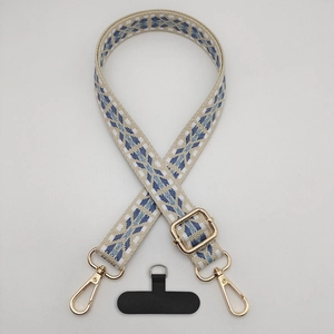 Adjustable blue and white geometric woven phone lanyard strap with gold metal lobster clasp