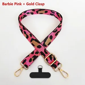 Barbie pink leopard print phone strap detail with gold adjustable buckle and hooks
