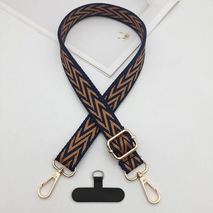 Adjustable woven phone strap with blue and brown herringbone pattern and gold metal hooks