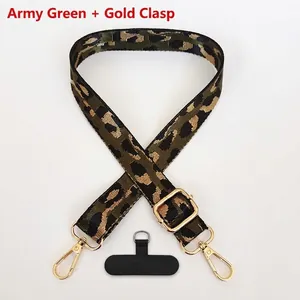 Detail view of army green leopard jacquard phone strap with gold hook and adjustable buckle