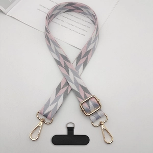 Cordon de téléphone ajustable à motif géométrique avec attaches métalliques dorées