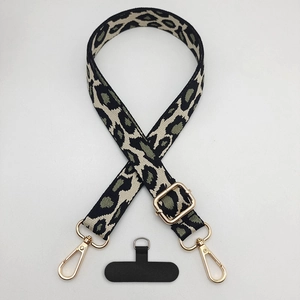 Adjustable leopard print crossbody phone strap with gold metal hooks and connector