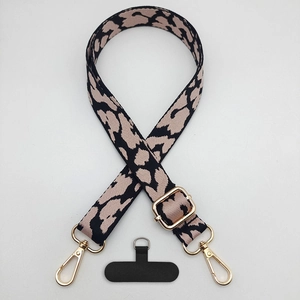 Pink leopard print phone lanyard with adjustable wide strap and gold metal hooks