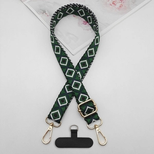 Detail of adjustable geometric diamond pattern phone lanyard with gold metal buckle