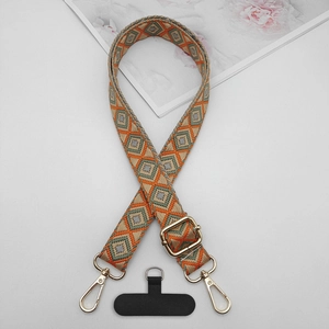 Ethnic geometric diamond weave crossbody phone strap with gold hardware and gasket