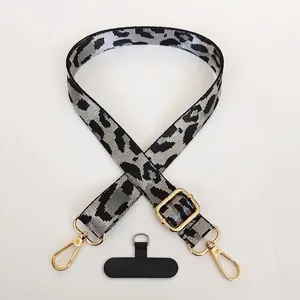 Adjustable silver grey leopard print polyester phone strap with elegant gold metal hook