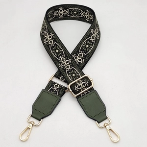 Adjustable wide shoulder strap for bags with green floral embroidery and gold hardware