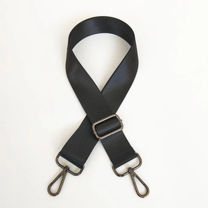 Detail of adjustable black nylon shoulder strap with gunmetal swivel snap hooks