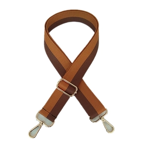 Adjustable nylon shoulder strap with brown contrast stripes and gold metal hardware