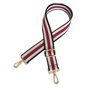 Adjustable wide canvas bag strap with burgundy red and white stripes and gold hooks