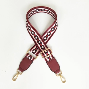 Adjustable wide replacement shoulder strap with red white black striped weave and gold clips