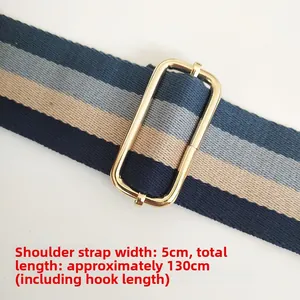 Adjustable 5cm wide striped canvas shoulder strap with light gold metal buckle