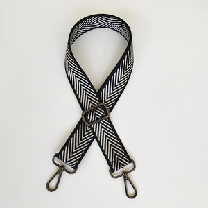 Adjustable black and white chevron embroidered strap with gunmetal hardware swivel hooks