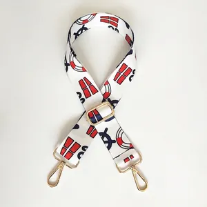 Close-up of adjustable wide woven shoulder strap with nautical geometric patterns