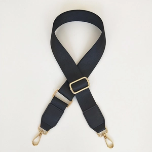 Adjustable black nylon bag strap with gold metal hooks for shoulder and crossbody bags
