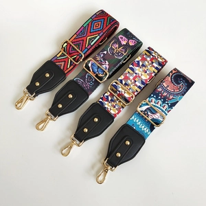 Adjustable canvas shoulder straps in ethnic patterns with gold hooks for crossbody bags