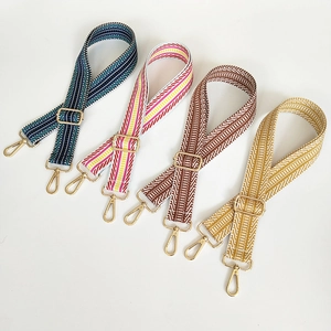 Adjustable wide canvas bag straps with ethnic embroidery and gold metal hardware hooks