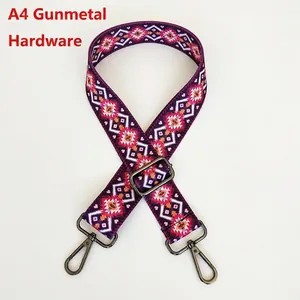 Close-up of bohemian geometric purple woven strap with gunmetal swivel snap hooks