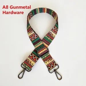 Close-up of bohemian style woven bag strap featuring colorful geometric patterns and gunmetal hardware