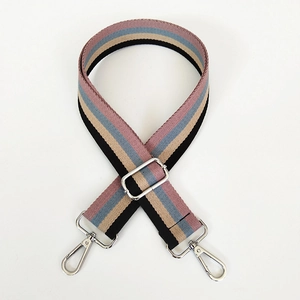 Detail of adjustable 3.8cm striped woven strap with silver metal lobster clasps
