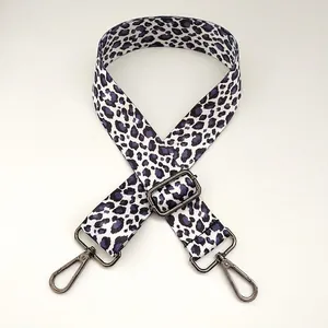 Detail of 3.8cm wide leopard print bag strap in blue-purple with gunmetal hardware hooks