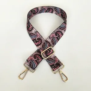 Adjustable wide shoulder strap with paisley pattern and gold hooks for handbags