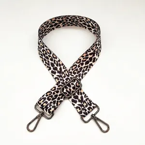 Detail of adjustable leopard print shoulder strap with gunmetal lobster clasps