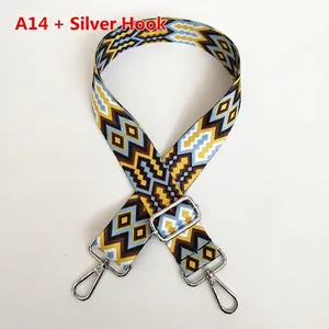 Detail of colorful geometric woven bag strap with durable silver metal spring hooks