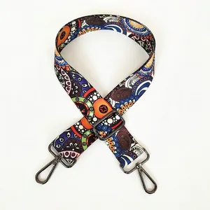 Detail of adjustable bohemian strap A11 with vintage pattern and metal gunmetal hooks