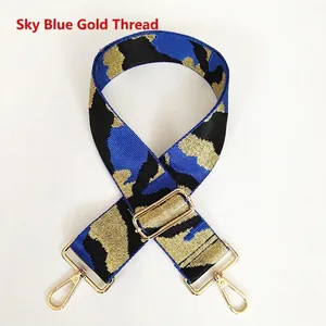 Detail view of adjustable blue and gold camouflage woven replacement shoulder strap for bags