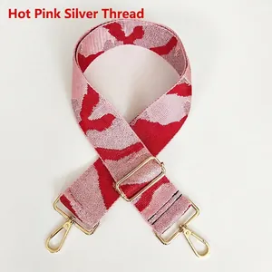 Detail of hot pink camo strap with silver thread and golden adjustable buckle