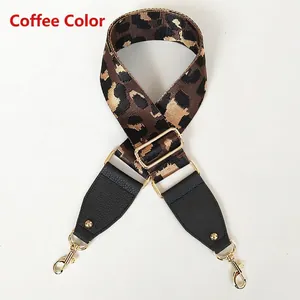 Detail of coffee leopard print bag strap with lychee leather and gold hardware