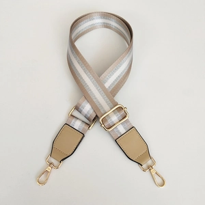 Verstelbare beige en zilveren gestreepte tasriem met gouden metalen gespen