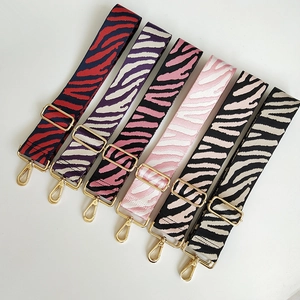 Adjustable zebra print wide shoulder strap with gold metal hooks in multiple colors