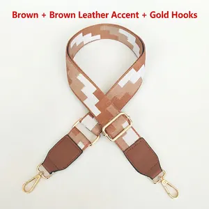 Adjustable wide replacement bag strap with brown geometric embroidery and gold hardware