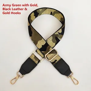 Detail of adjustable camo bag strap with green gold embroidery and metal hooks