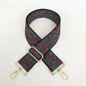 Detailed embroidery on vintage floral wide bag strap with light gold hardware