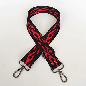 Adjustable black strap with red flame pattern and swivel hooks for shoulder bags
