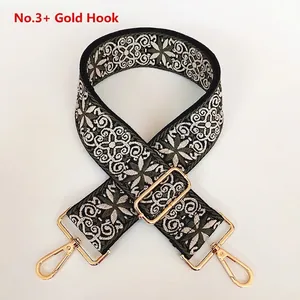 Bandoulière brodée style ethnique avec motifs floraux et mousquetons dorés brillants