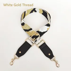 Detail of adjustable leopard strap with gold metallic thread and premium leather ends