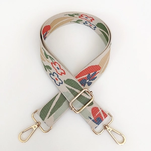 Adjustable wide canvas shoulder strap with colorful floral embroidery and gold hooks