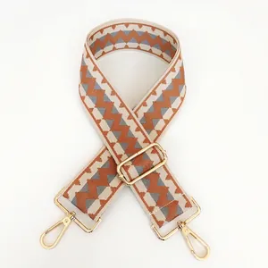 Ethnic style wide replacement shoulder strap with orange and grey geometric weave and gold hooks