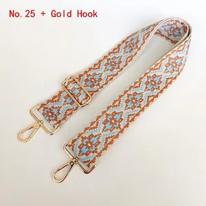 Adjustable wide canvas shoulder strap with blue and caramel diamond geometric patterns