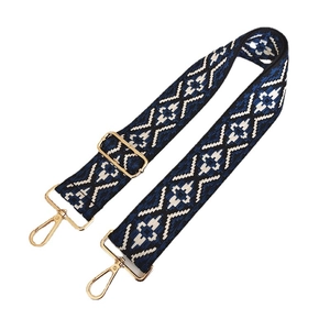Adjustable wide canvas shoulder strap with geometric diamond pattern and gold hardware