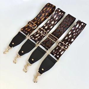 Adjustable leopard jacquard nylon bag straps with leather ends and gold metal hooks