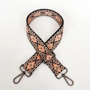 Detail of colorful jacquard guitar style handbag strap with gunmetal swivel hooks
