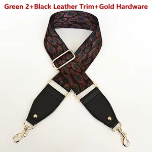Detail of adjustable leopard print bag strap with green pattern and golden metal hooks