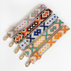Adjustable jacquard canvas bag strap with colorful diamond patterns and gold lobster clasps