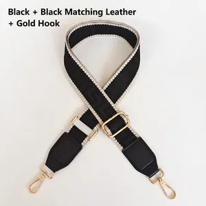 Tracolla regolabile in jacquard geometrico nero con terminali in pelle e ganci dorati